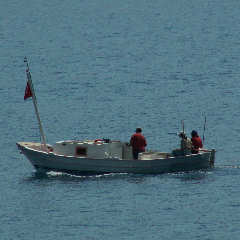 a boat below the Caretta